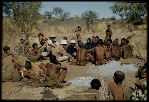 Expedition, Ethnographic work: Group of people talking with Lorna Marshall, Laurence Marshall, Kernel Ledimo and other expedition members, coming to an agreement about mutual arrangements