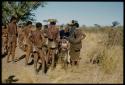 Expedition, Ethnographic work: Group of people standing with Kernel Ledimo and Lorna Marshall