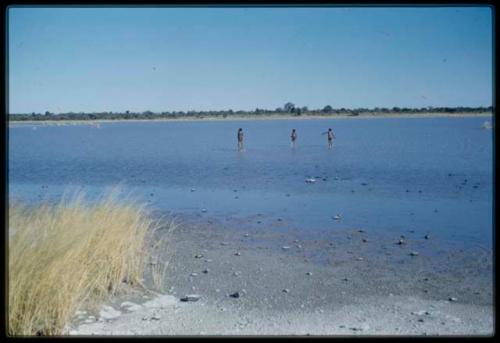 Scenery, Pan: Three children playing in Gautscha Pan full of water