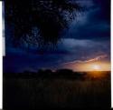 Scenery, Pan: Sunset, rain clouds in the sky, with Gautscha Pan in the distance