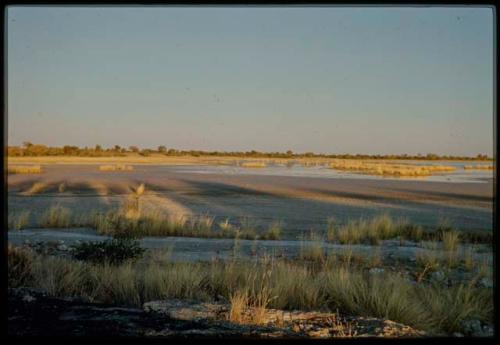 Scenery, Pan: Gautscha Pan with a little water left in it, with long shadows on it