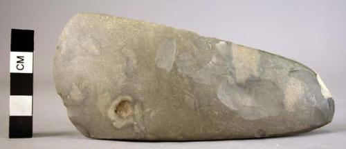 Polished limestone axe