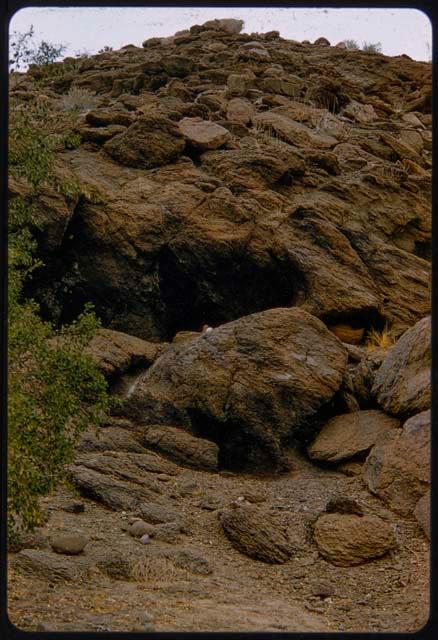 Baskets inside a cave, distant view