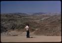 Kurt Ahrens standing on a sand dune