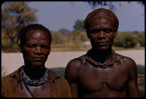 Mukolovandi and Kamati standing together