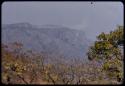 Smoke coming from a supposedly uninhabited point on an escarpment