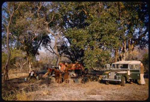 People standing in the expedition camp at Hambia's living place