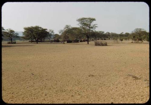 Huts surrounded by over-grazed land