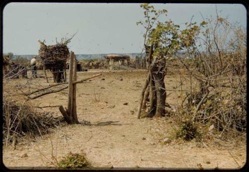 Gate, with village in the background