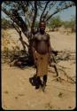 Man standing in front of a tree