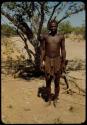 Man standing in front of a tree