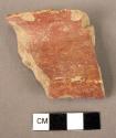 Potsherd - red slipped, local copy of Minyan form