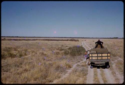 Wilhelm Camm on top of expedition Dodge truck