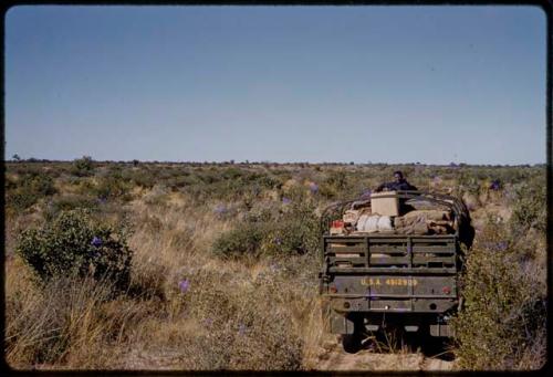 Philip Hameva sitting in an expedition truck