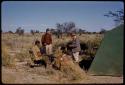 L. F. Maingard, Daniel Blitz, Dabe, and Kernel Ledimo interviewing a person sitting