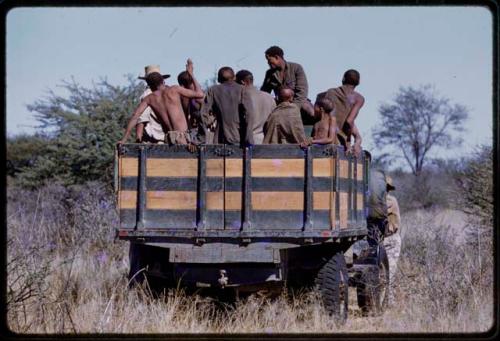 People sitting in a Marshall Expedition truck