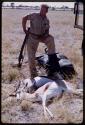 Theunis Berger standing with a hunting kill