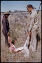 Dabe and William Donnellan holding a springbok