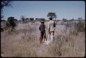 Dabe and William Donnellan walking with a springbok