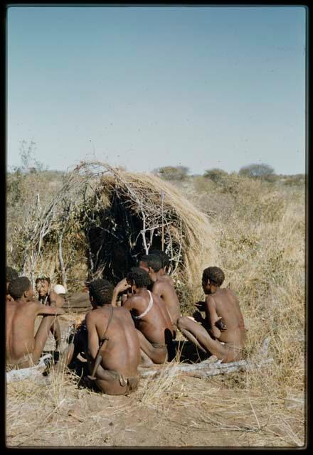 Story Telling, Story: Group of people sitting in front of Zuma's skerm