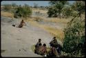 Water Hole: !U, //Kushay and !Ungka sitting next to a waterhole, with "/Qui Navel" sitting on a ledge in the distance with an Ovambo pot next to him