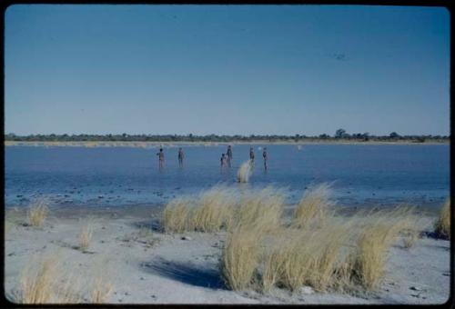 Water Hole: Boys playing in water in Gautscha Pan