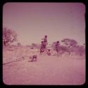 Children, Groups, Play: Girls and boys standing and sitting on an anthill