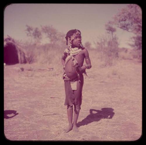 Children, Portraits: ≠Gisa wearing a little kaross and an ostrich eggshell beaded apron