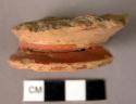 Pottery base fragments - red painted bands on base