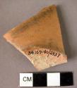 Pottery base fragment - slipped, burnished - interior glazed