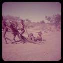 Children, Toys, Playthings: Three boys pulling two little boys on a kaross