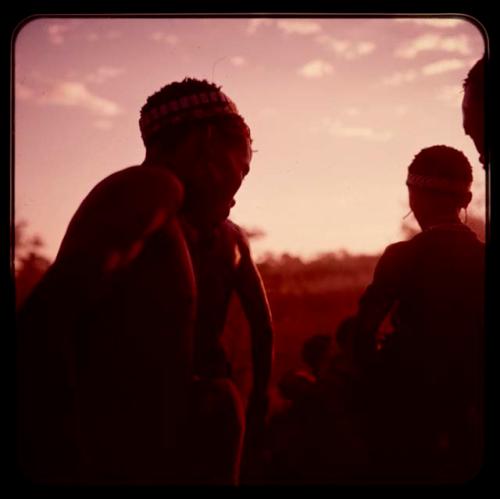 Men performing a curing dance