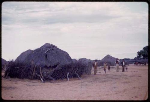 Village, people outside a hut