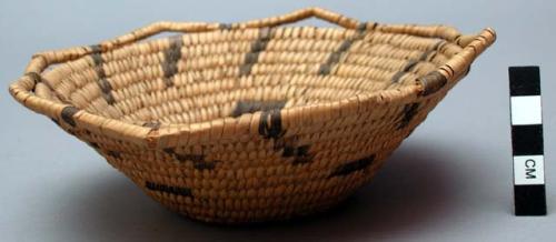 Basket, coiled. Open-work rim. Geometric designs.