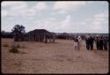 Expedition members leaving the village