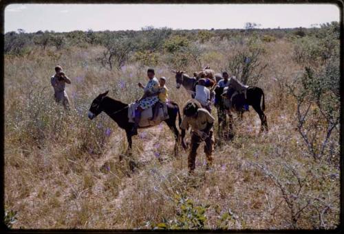 Travelers on donkeys, Theunis Berger taking a picture in the background