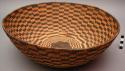 Medium basket tray, coiled. Made of devil's claw and willow or cottonwood.