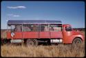 Witwatersrand Native Labour Association bus full of people, on a road