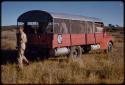 Witwatersrand Native Labour Association bus, Theunis Berger walking behind