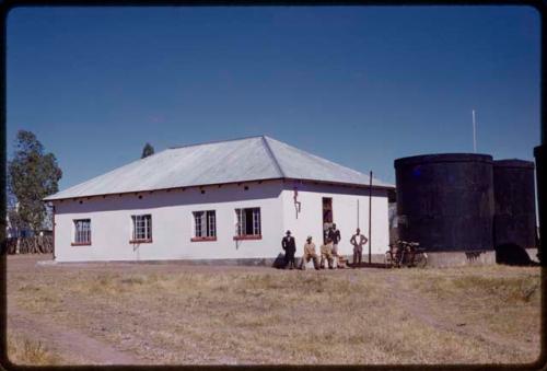 Police building, people outside