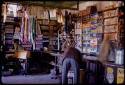 Inside Knobel's store, people at the counter