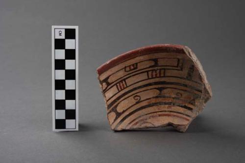 Large fragment of polychrome pottery tripod bowl