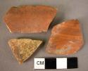 1 rim sherd, 5 potsherds, all Mycenaean, monochrome red glaze