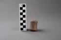 Ceramic cylinder, concave sides, incised designs