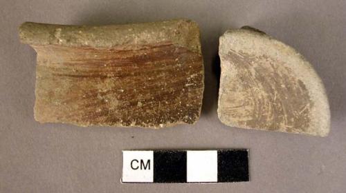 2 rim potsherds; 1 pottery base fragment   1 burnished bowl rim in tray. E.R.