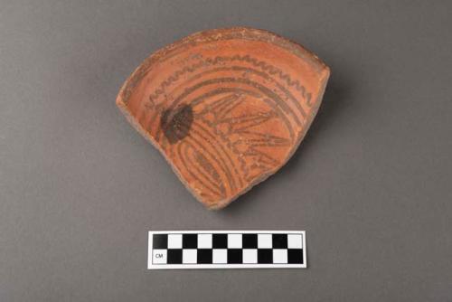 Pottery bowl fragments-black on red