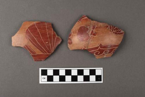 Incised red on buff potsherds