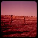 Three boys standing on a shore on "Boer War Memorial Day"