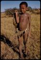 Boy carrying a bird