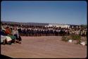 Girl and boy scouts standing in lines for a ceremonial parade on Queen Elizabeth's birthday